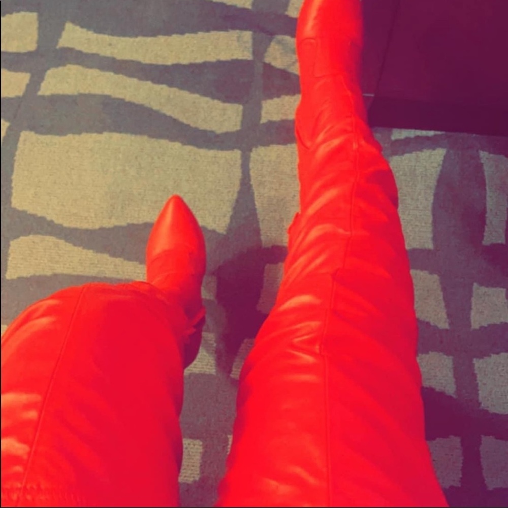 Red knee high boots worn only once